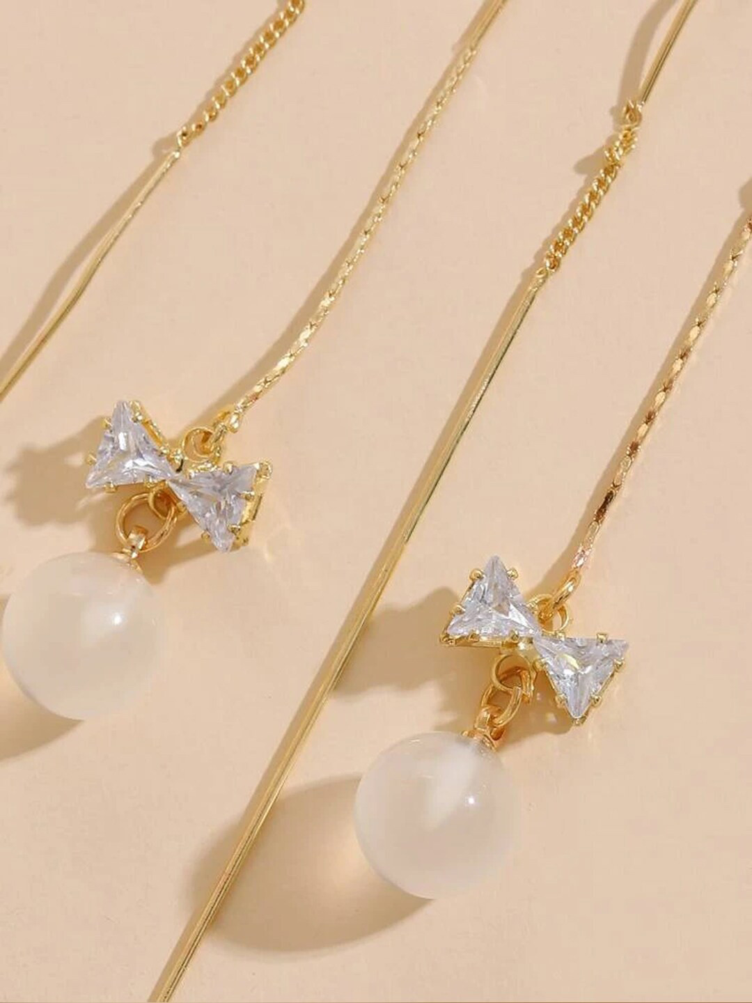 Yellow Chimes Women Gold-Toned Long Chain Tassel Bow Knot Shape Pearl Drop Earrings
