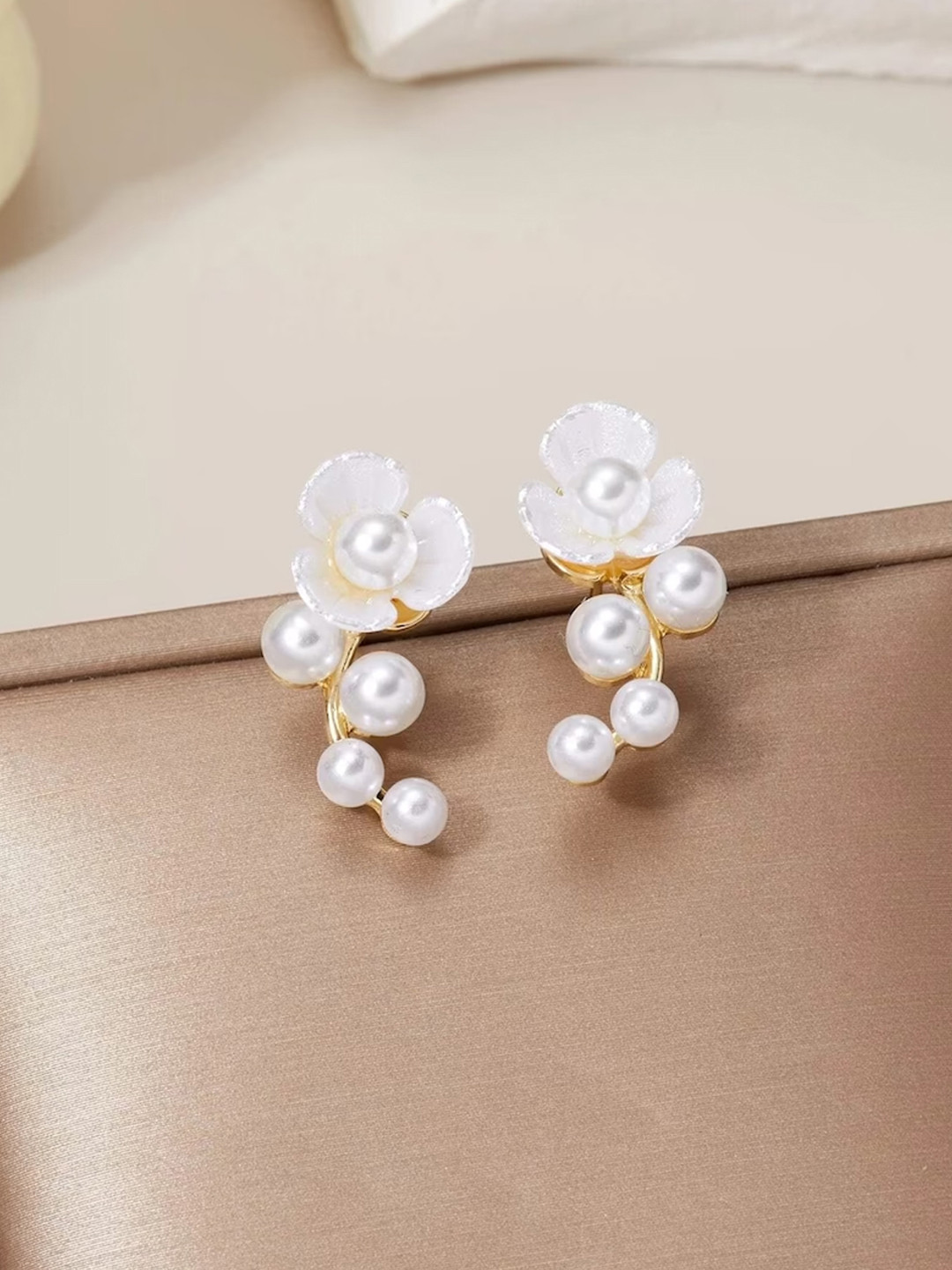 Unwind by Yellow Chimes Women Gold-Plated & White Pearl Studded Studs Earrings