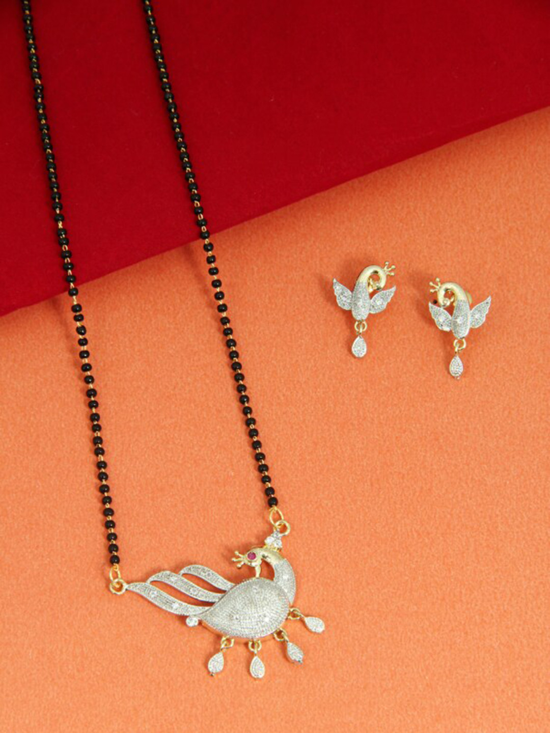 FEMMIBELLA Gold-Plated & Black American Diamond Studded Hanging Mangalsutra With Earrings