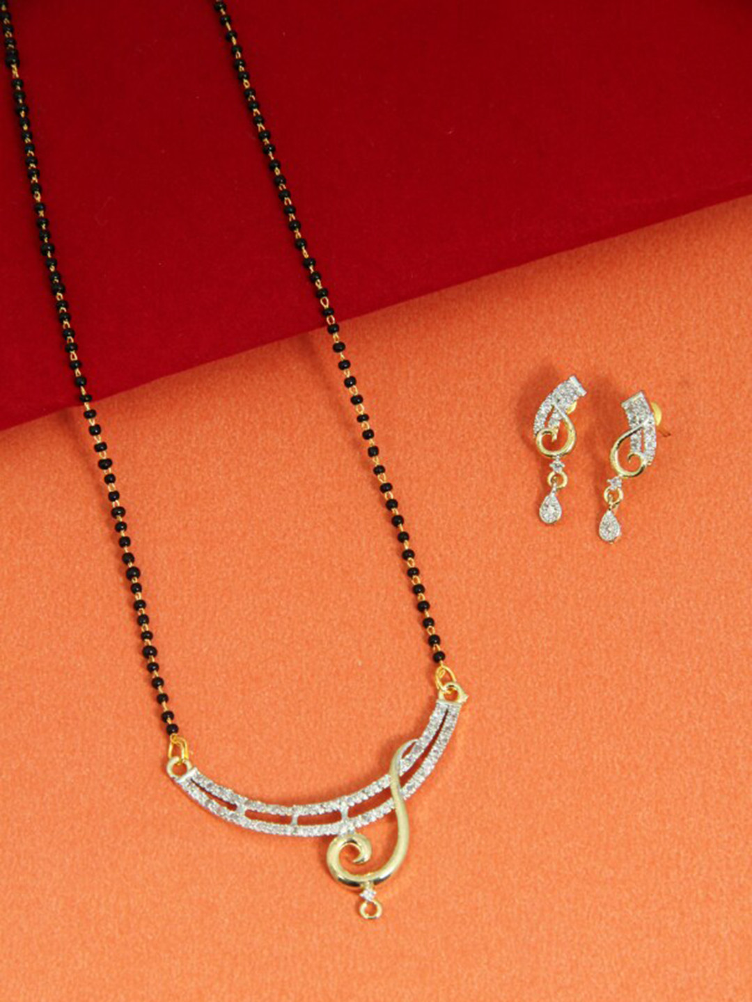FEMMIBELLA Gold-Plated Black & White Stone-Studded & Beaded Mangalsutra With Earrings