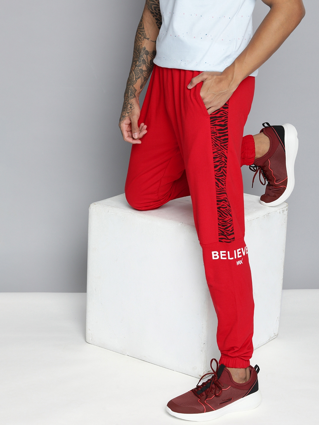 Buy HRX By Hrithik Roshan Men Red Pure Cotton Printed Regular Fit Joggers -  Track Pants for Men 19444588