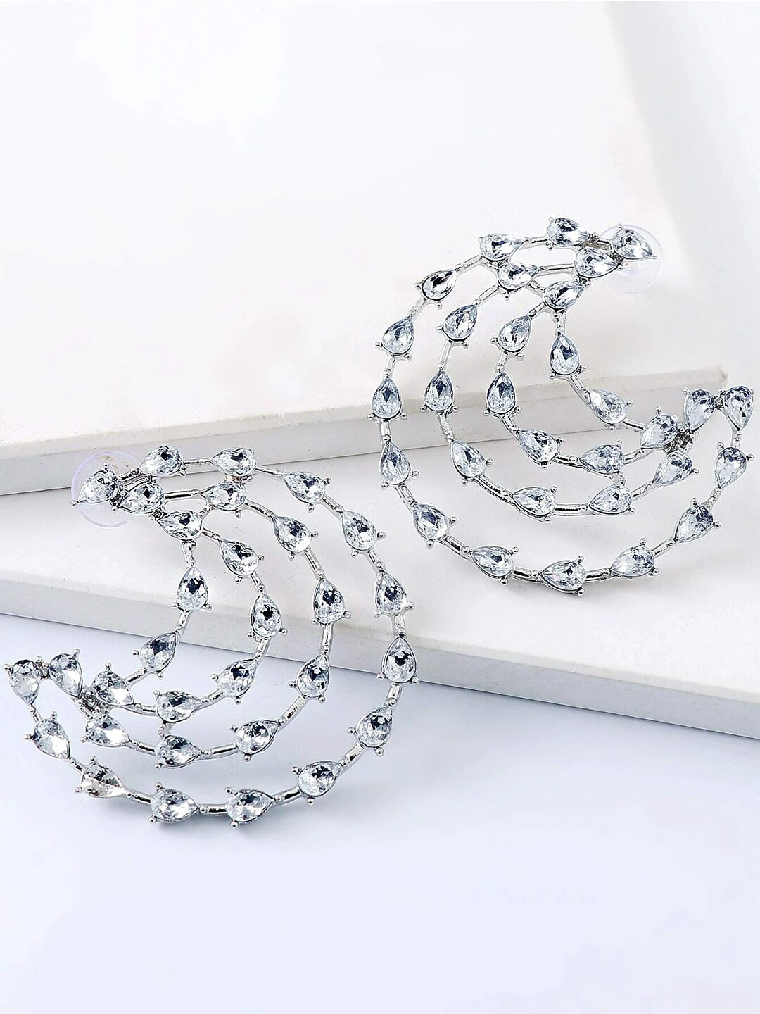 Yellow Chimes White Crystal Studded Crescent Shaped Earrings