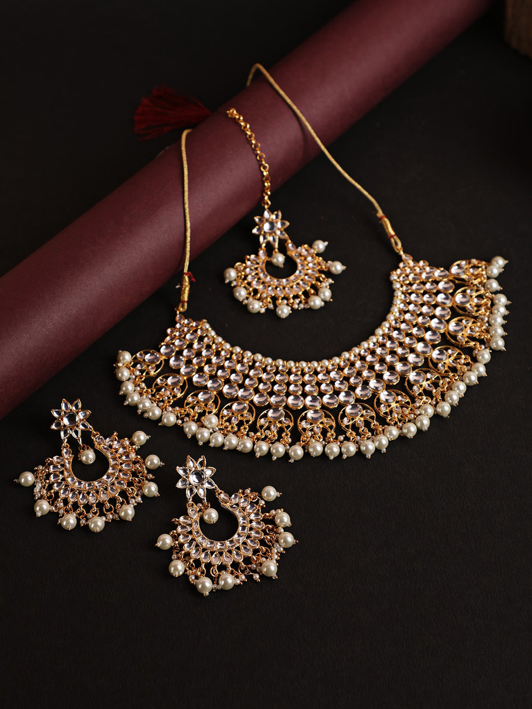 Jazz and Sizzle Gold-Plated White Kundan & Bead StuddedvJewellery Set With Maang Tika