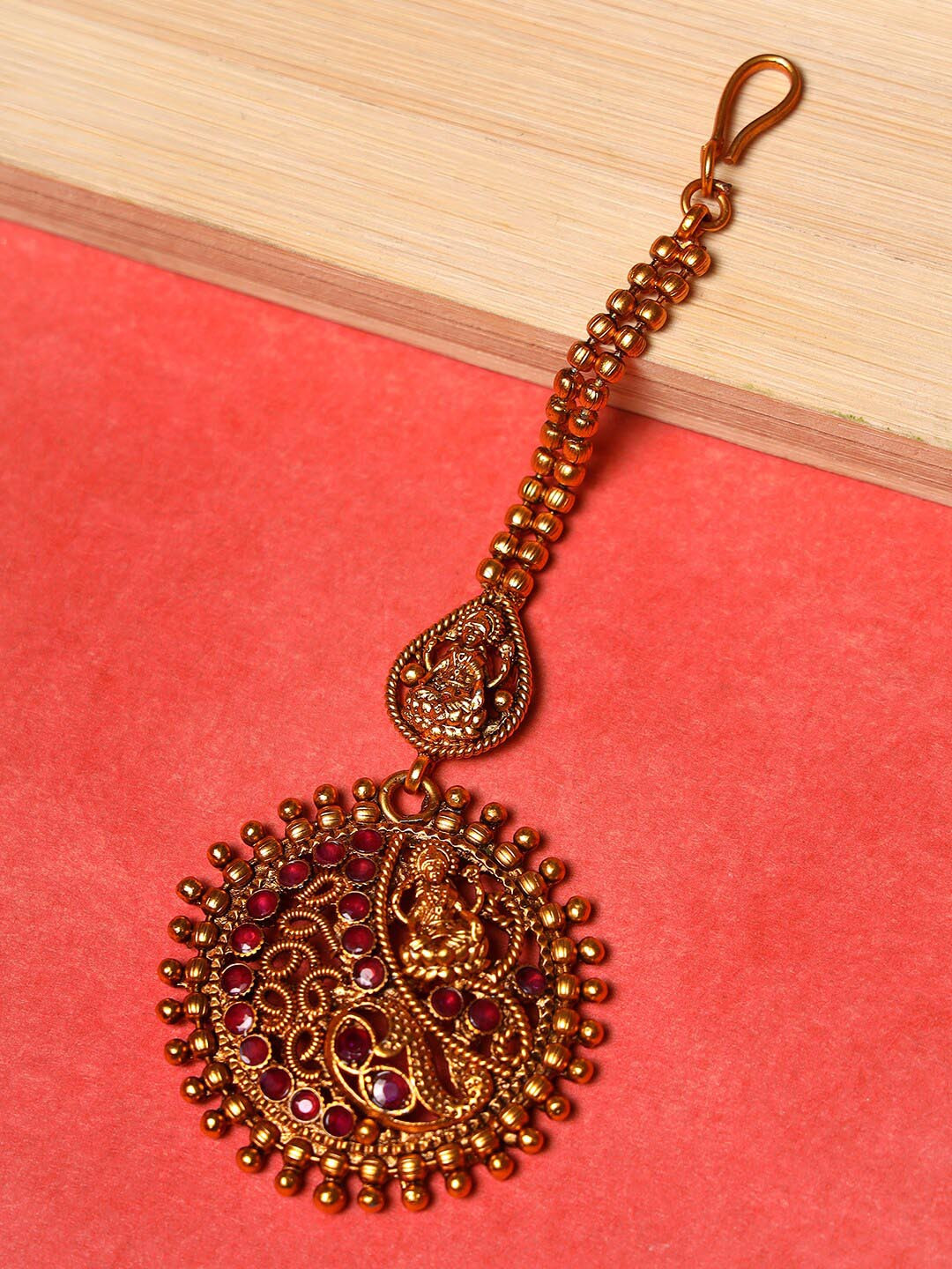 Jazz and Sizzle Gold-Plated Maroon Stone Studded Handcrafted Temple Maang Tikka