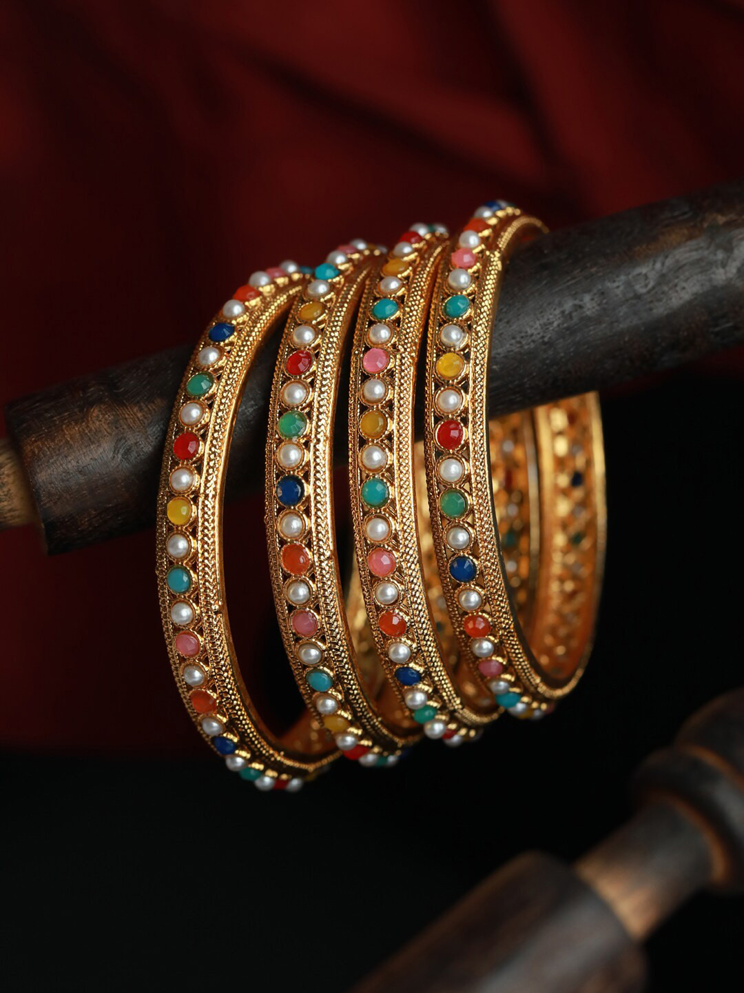Jazz and Sizzle Set Of 4 Gold-Plated White & Blue Stone Studded Handcrafted Bangle