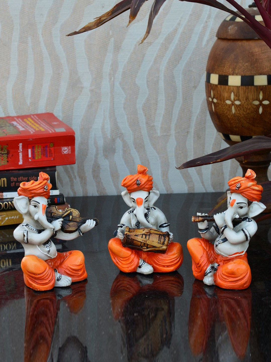 eCraftIndia Ganesha Playing Violen Orange Polyresin Glossy Prayer Room Set of 3 Small Showpieces - 2.8 Inches
