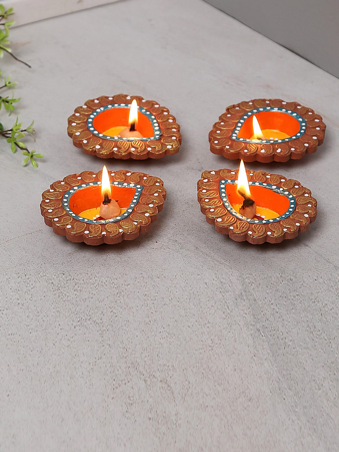 Aapno Rajasthan Pack Of 4 Brown Delicately Carved Diyas