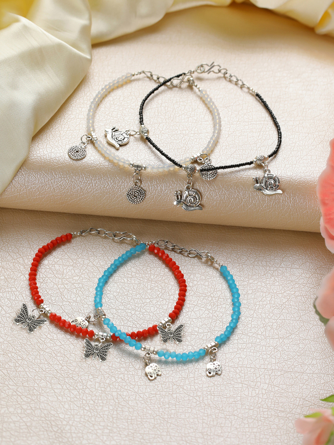 Jazz and Sizzle Women Set Of 4 Silver-Toned Black And White beaded Anklets