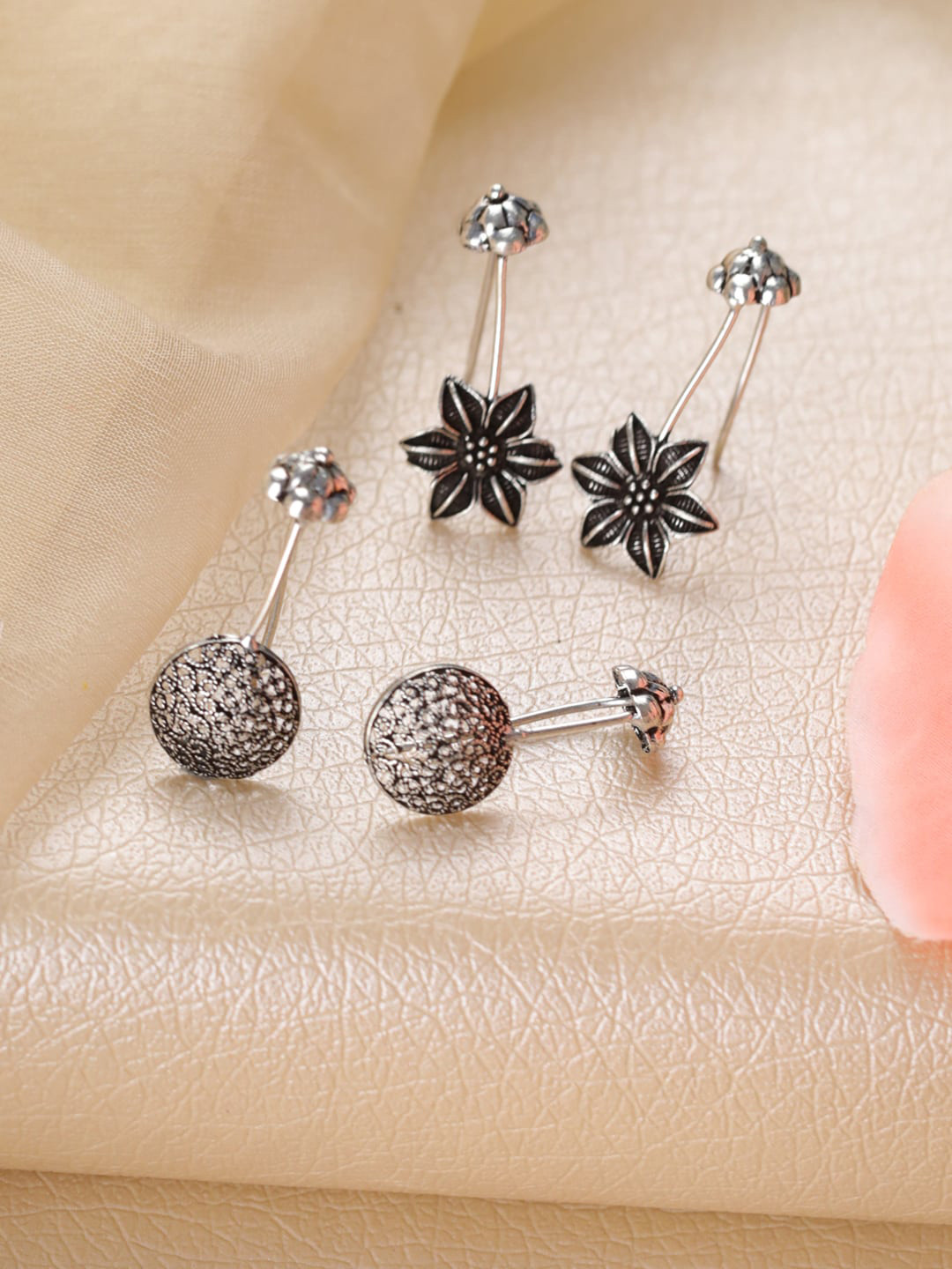 Jazz and Sizzle Silver Plated Floral Oxidised Studs Earrings