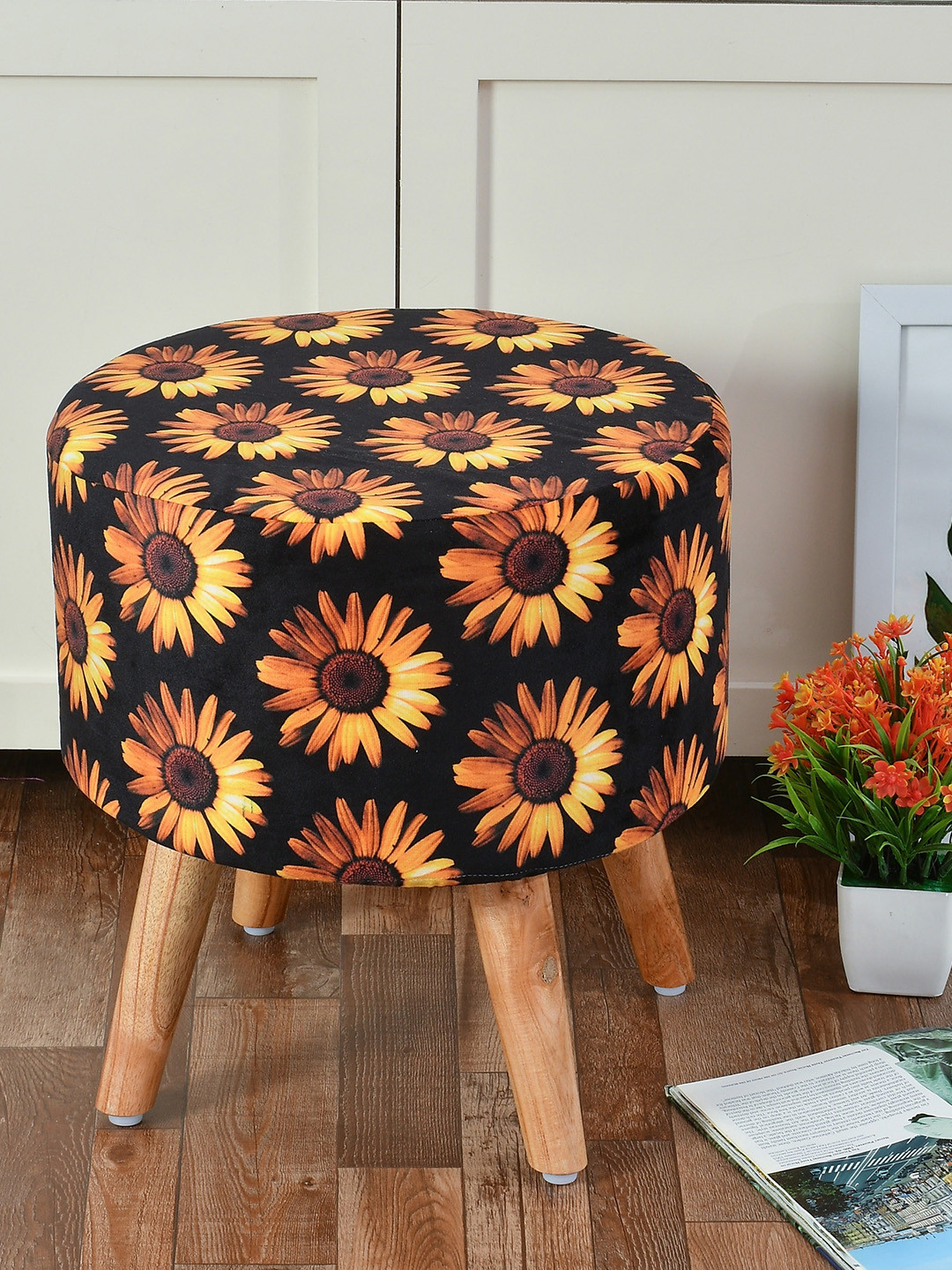 RIANCE CREATIONS Black Printed Ottoman With Wooden Legs