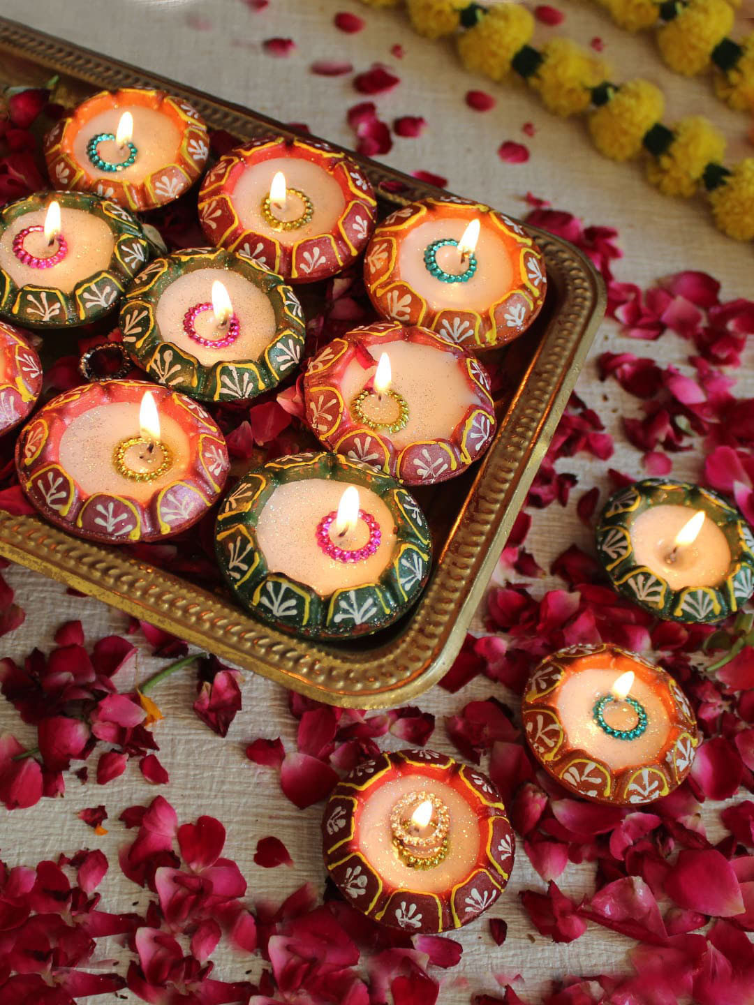 TIED RIBBONS Set of 12 Multicoloured Terracotta Clay Wax Filled Diya Candles