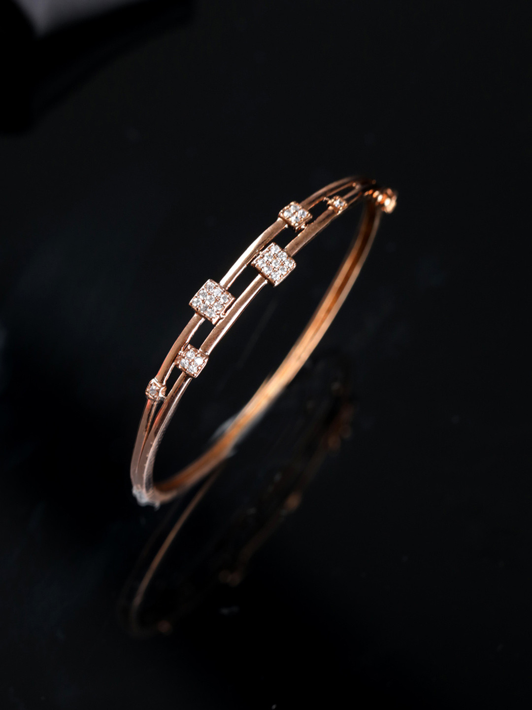 Jazz and Sizzle Women  Brass American Diamond Rose Gold-Plated Bangle-Style Bracelet