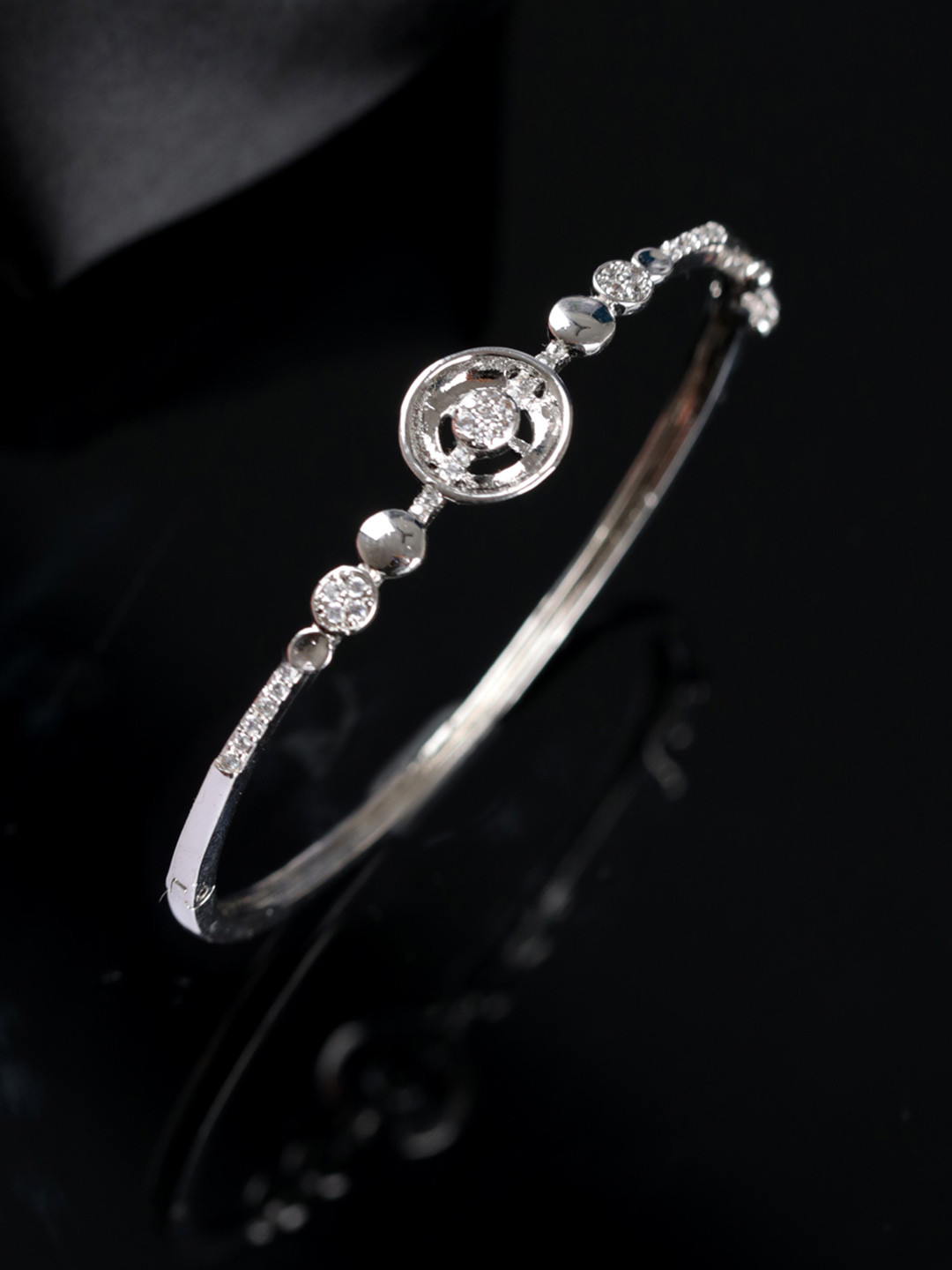 Jazz and Sizzle Women Brass American Diamond Silver-Plated Bangle-Style Bracelet