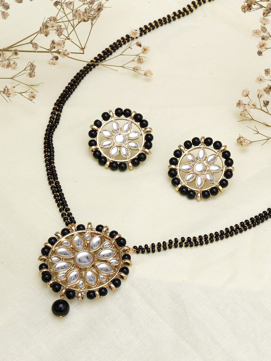 KARATCART Black Gold-Plated Beads Studded Mangalsutra With Earrings