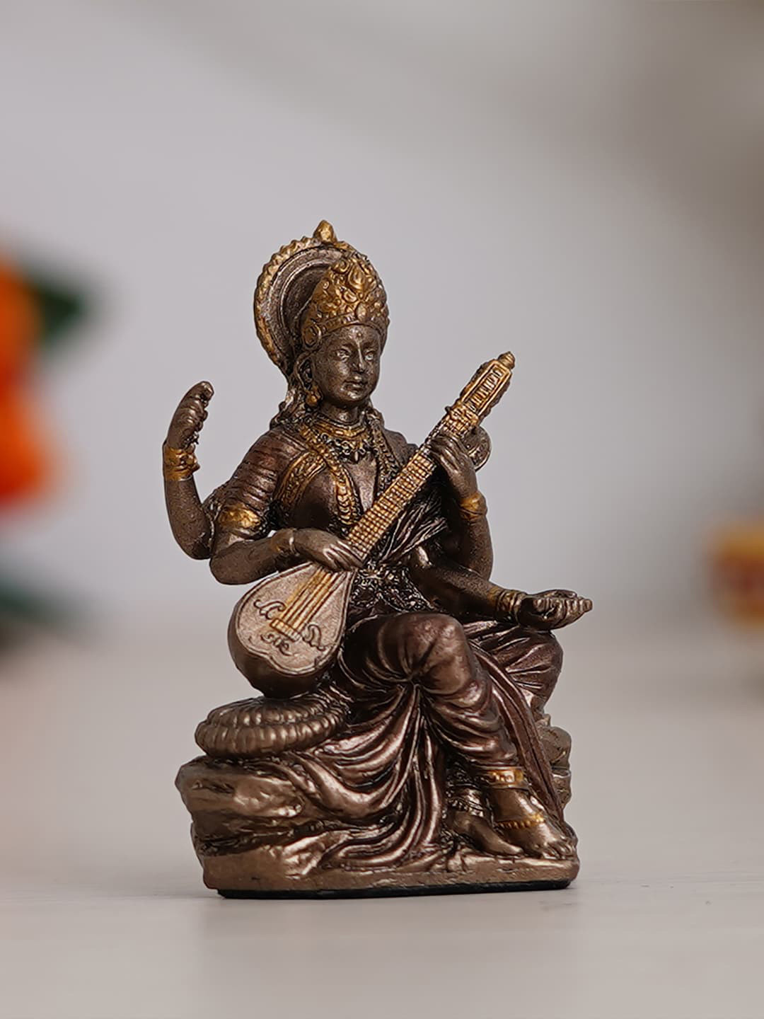 Artisyn Goddess Saraswati Playing Veena Brown Resin Glossy Prayer Room Small Showpiece - 3.1 Inches