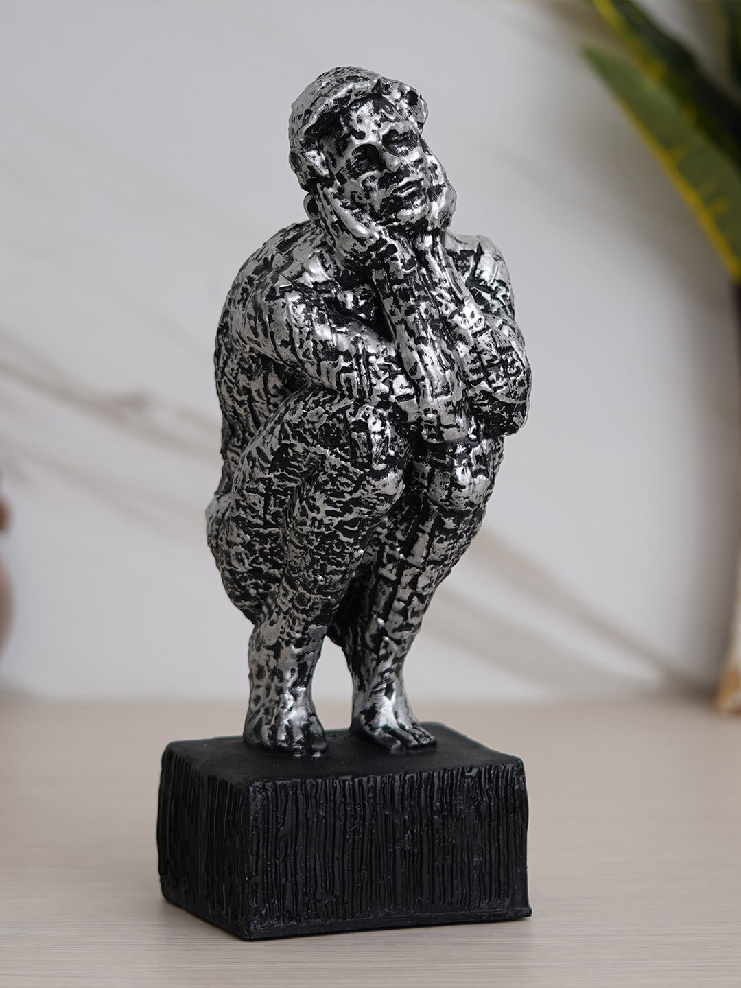 eCraftIndia Man Sitting and Thinking Human Silver Polyresin Glossy Living Room Medium Showpiece - 12 Inches