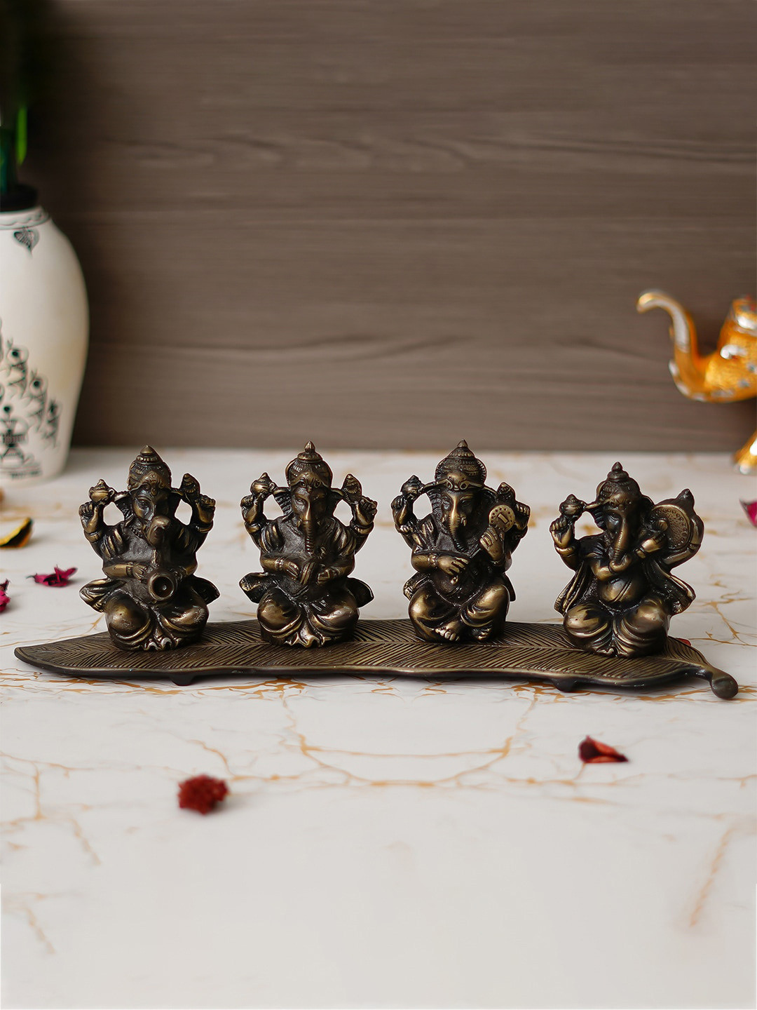 eCraftIndia Lord Ganesha on Leaf Gold Metal Metallic Prayer Room Set of 4 Small Showpieces - 4.1 Inches