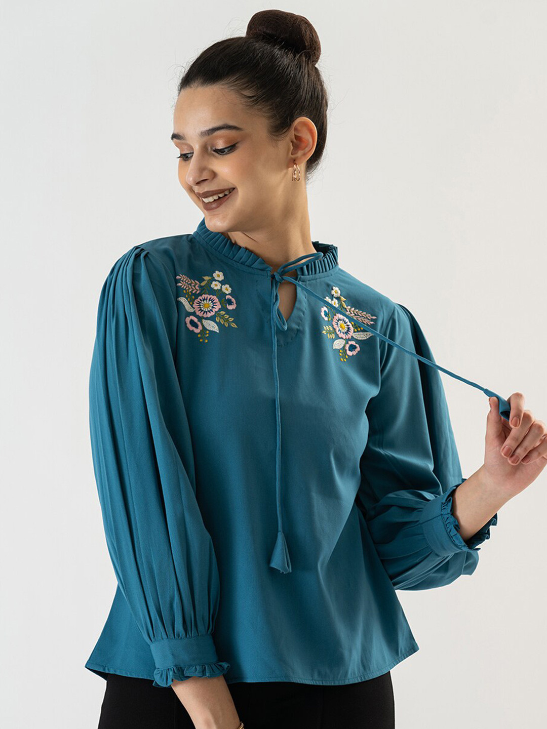 Prettify Women Sky Blue Floral Embroidered Tie Up Neck Pleated Crepe Top