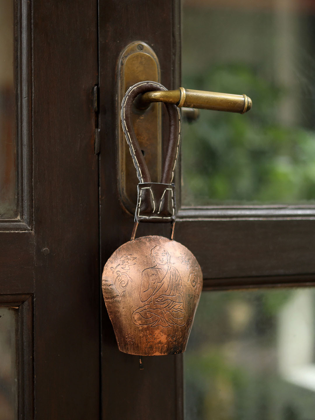 DULI Brown Metal Cowbell Windchime with Embossed Buddha Design