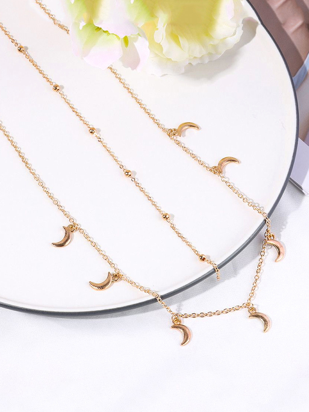 Unwind by Yellow Chimes Gold-Toned Multilayered Crystal Studded Moon Charm Waist Chain