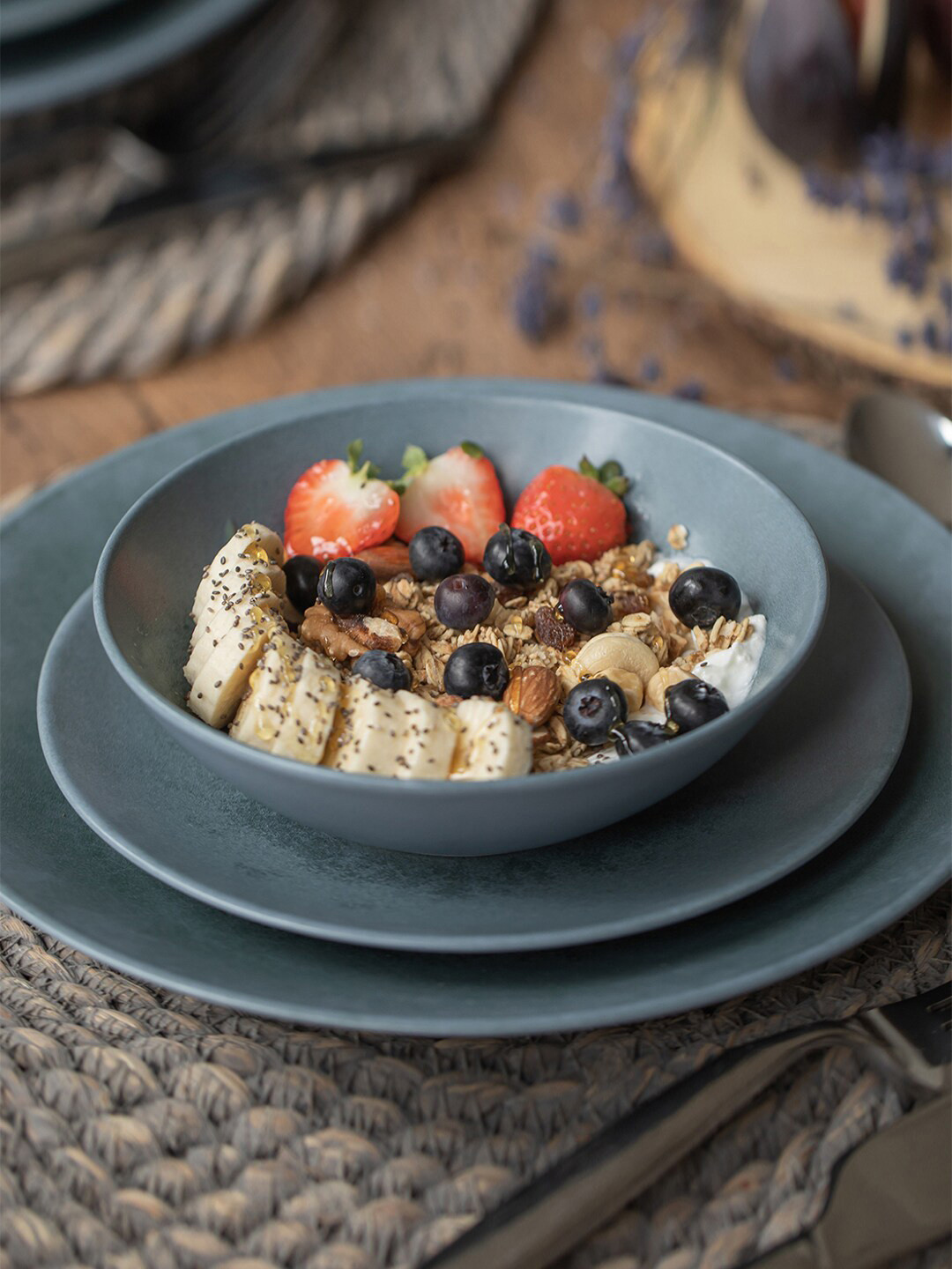 MIKASA Reactive Blue Solid Stoneware Microwave Safe 12 Piece Dinner Set