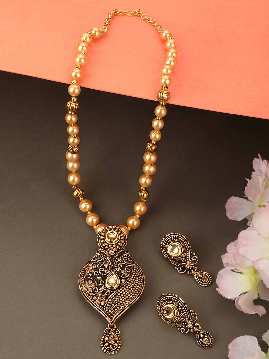 ANIKAS CREATION Gold-Plated & Toned Off White Artificial Stones and Beads Jewellery Set