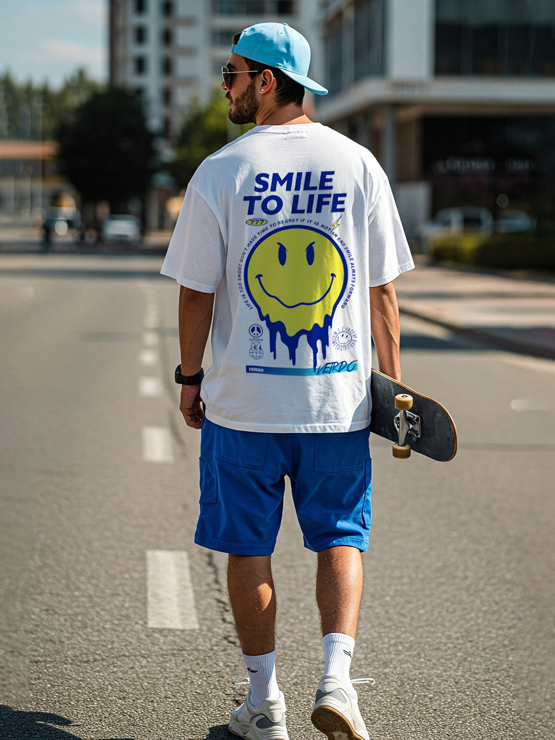 VEIRDO Men White Graphic Printed Oversized T-shirt