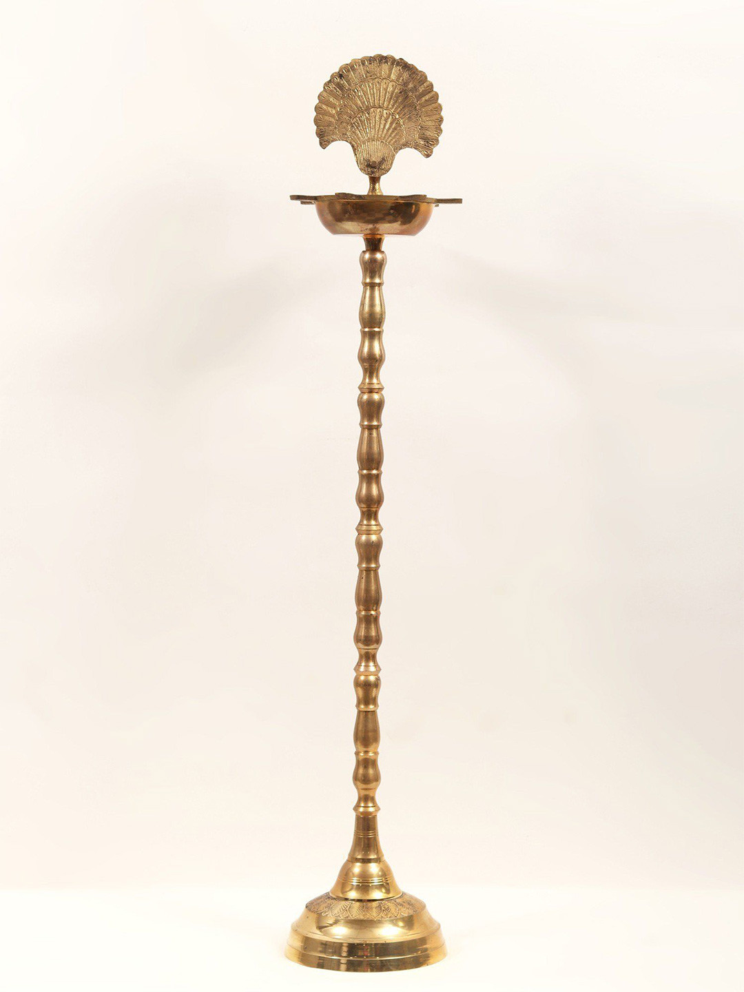 Exotic India Brass Seven Wicks Peacock Design Lamp