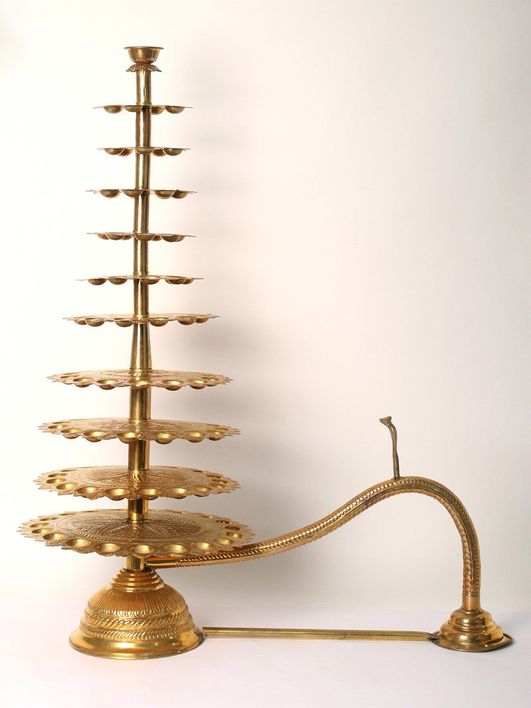 Exotic India 10 Layer Brass Hand-Held Oil Lamp