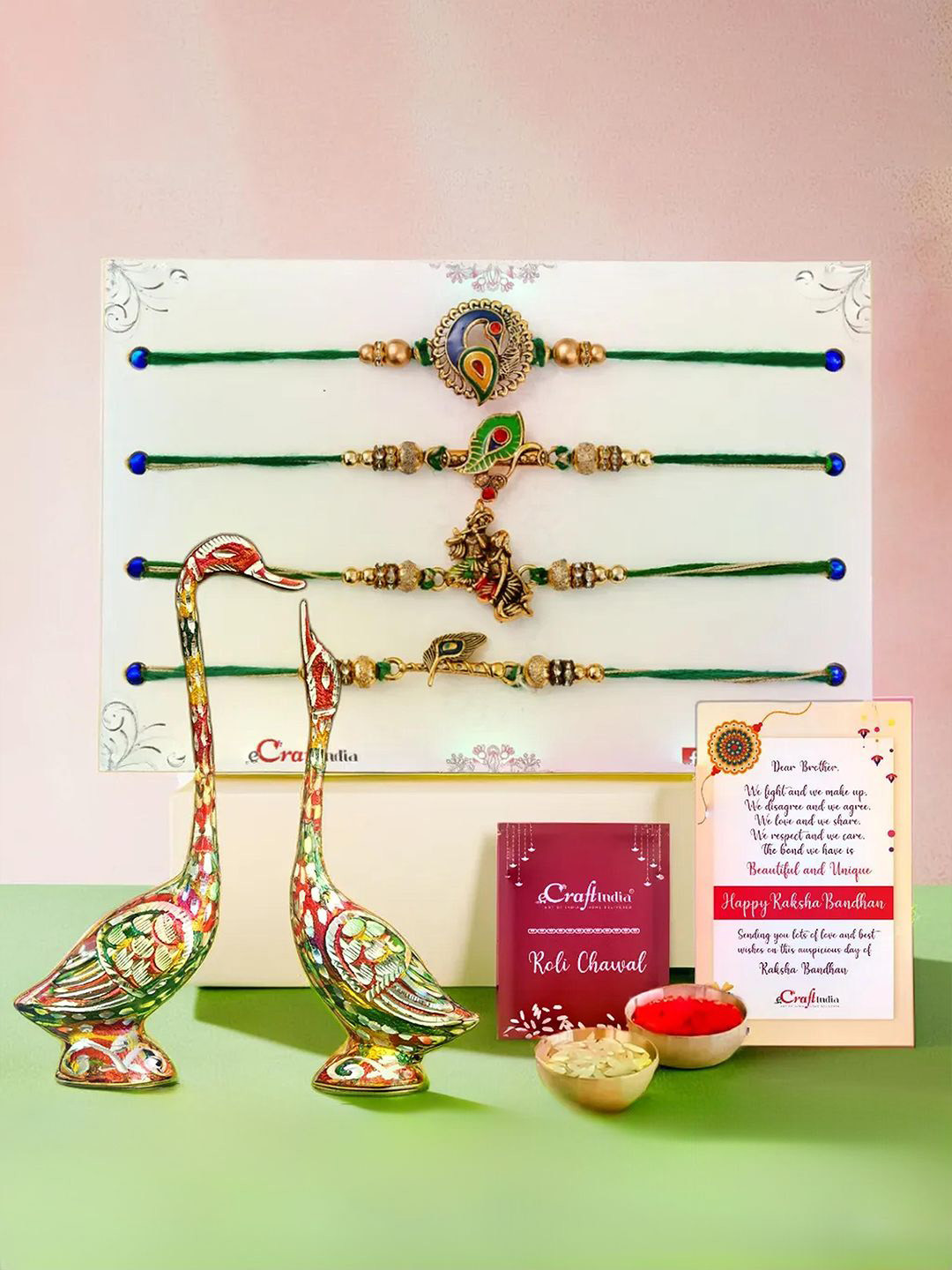 eCraftIndia Set of 4 Designer Rakhis With Metal Kissing Swan Couple Statue