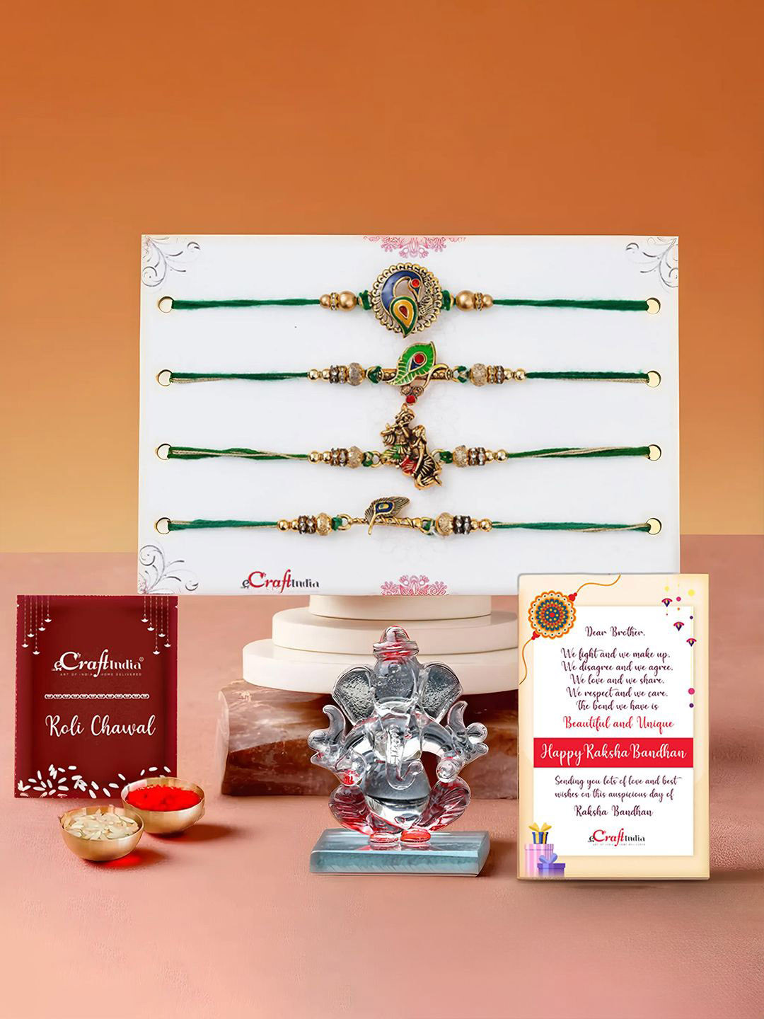 eCraftIndia Set of 5 Designer Rakhis With Crystal Lord Ganesha Idol Gift Set