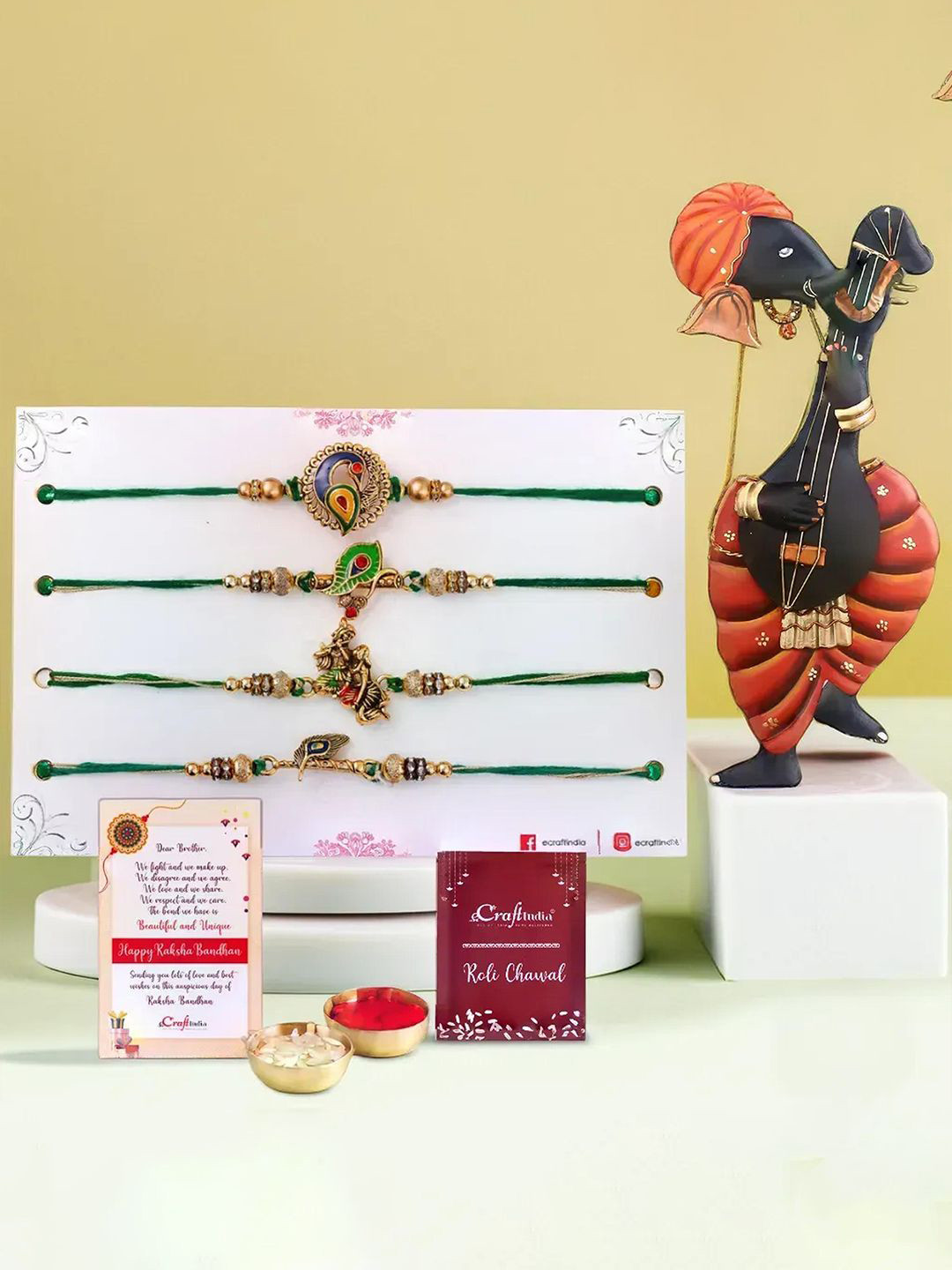 eCraftIndia Set of 4 Designer Rakhis With Ganesha Playing Sitar Showpiece