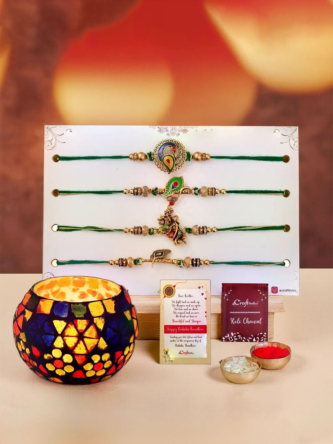 eCraftIndia Set Of 4 Rakhis With Mosaic Glass Tea Light Holder With Roli Chawal