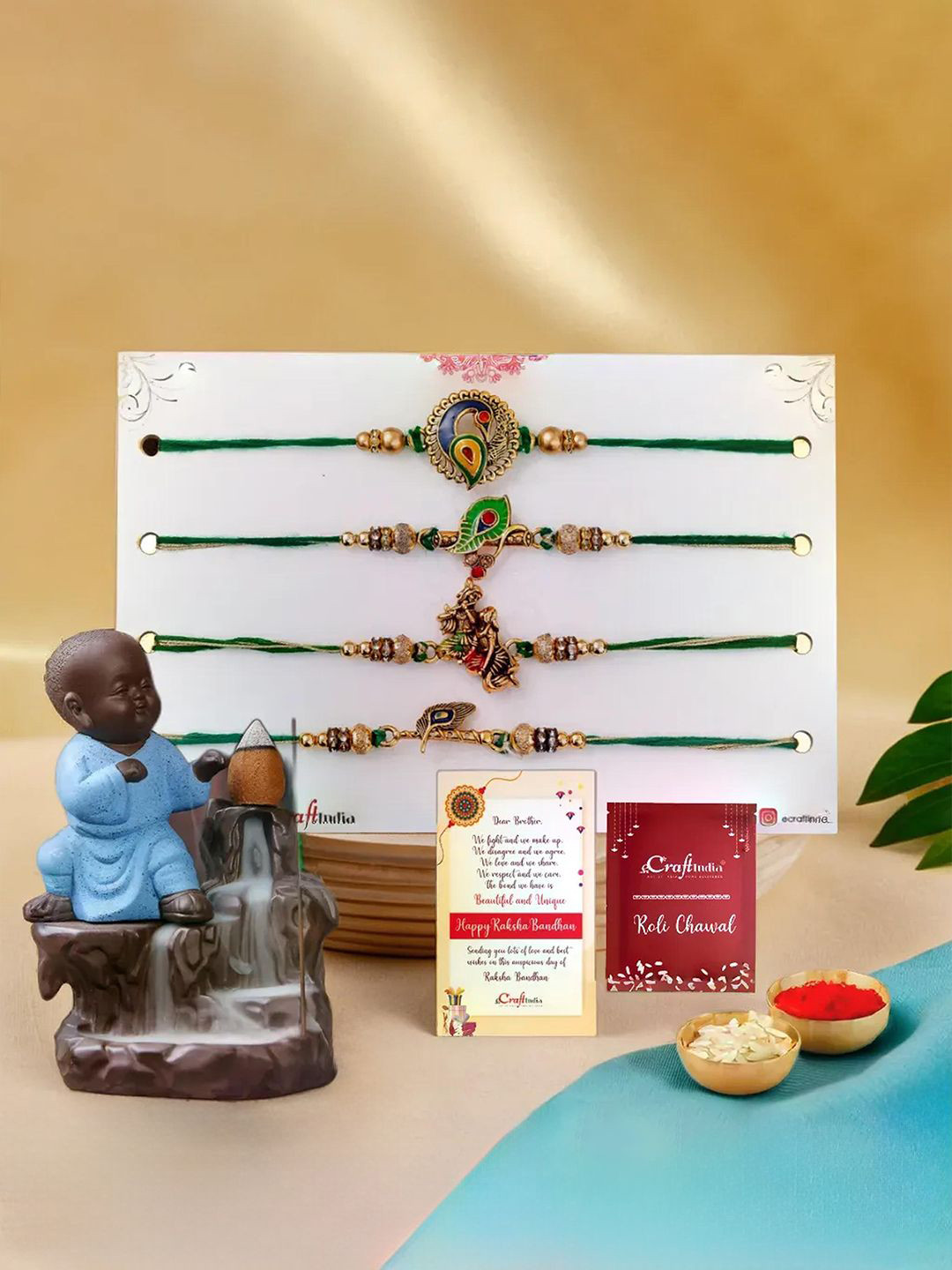 eCraftIndia Set of 4 Rakhi With Buddha Statue & Greeting Card With Roli Chawal Gift Set