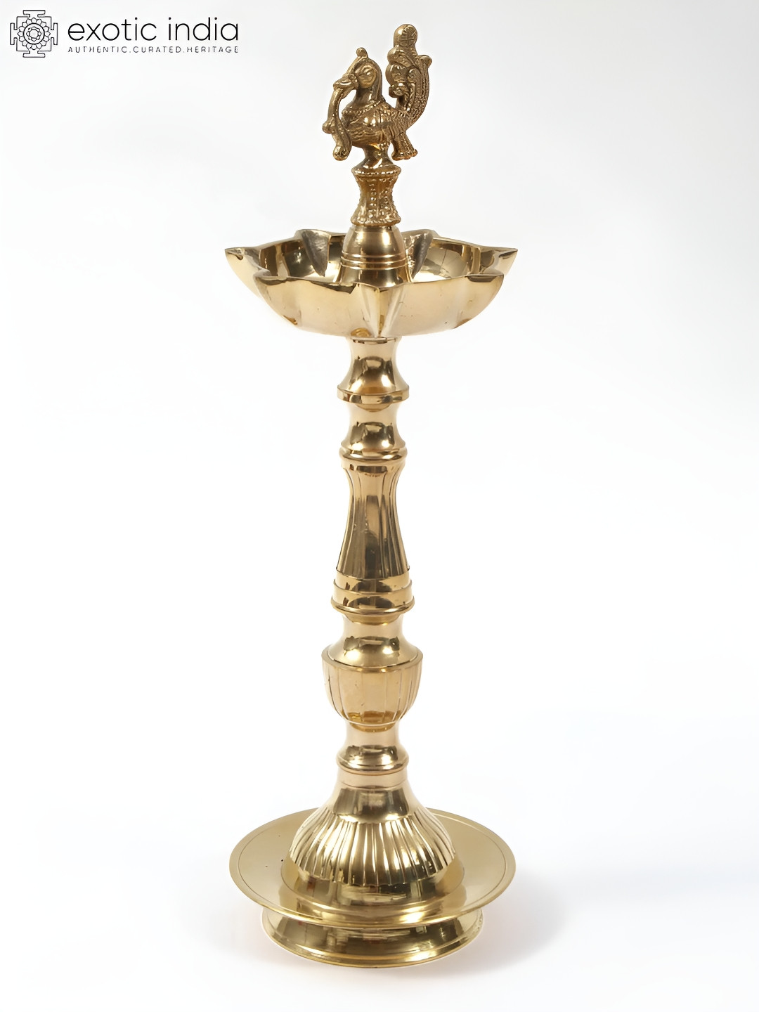 Exotic India Brass Seven Wicks Peacock Oil Lamp - Kuthu Vilakku