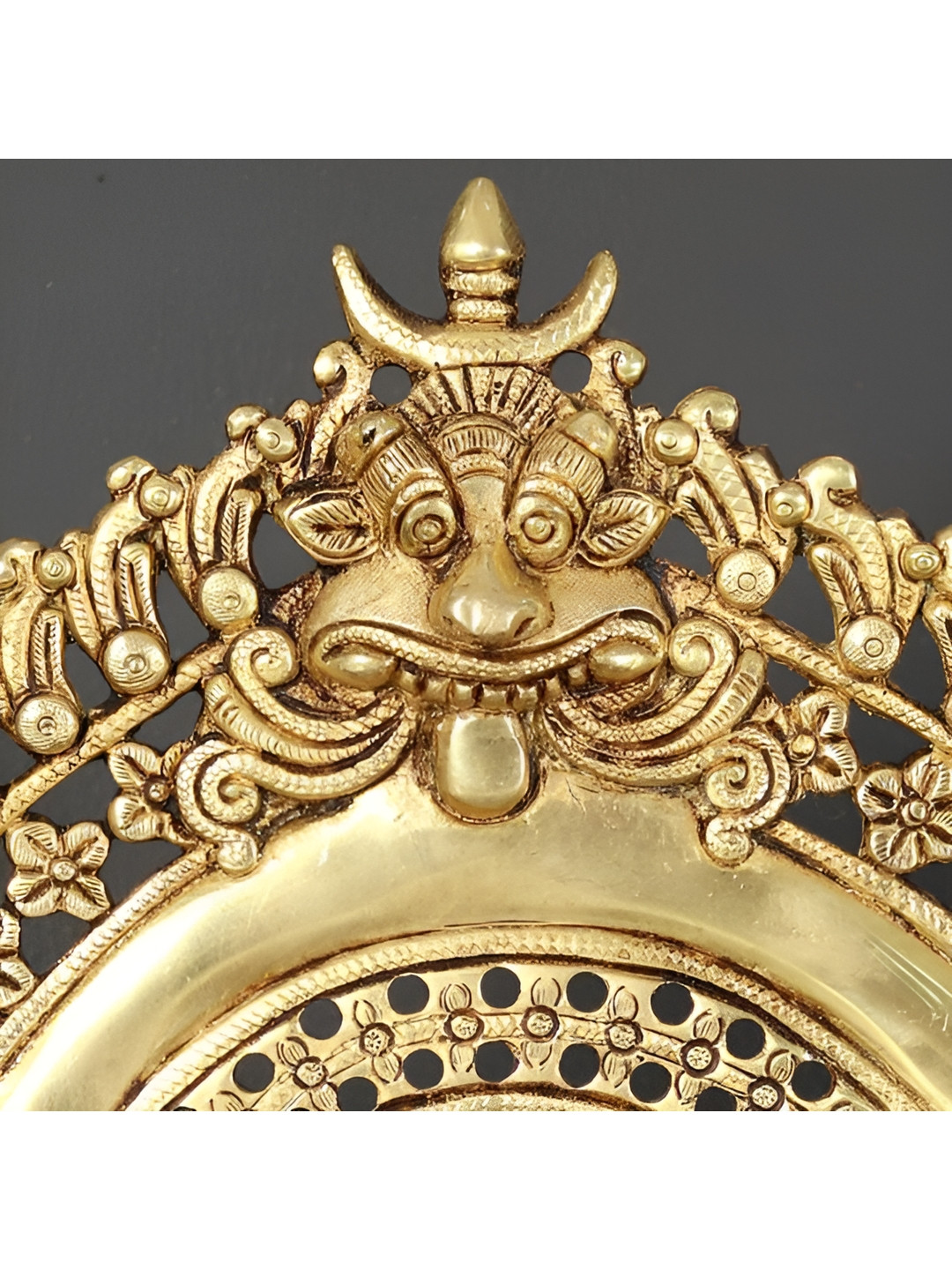 Exotic India Kirtimukha Throne Gold Brass Metallic Prayer Room Large Showpiece - 12 Inches