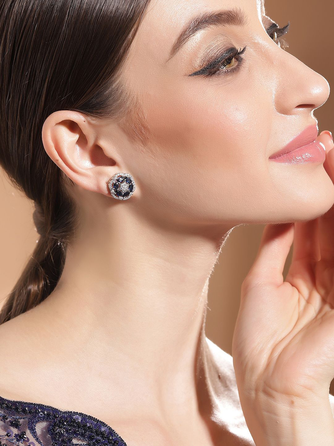 Priyaasi Silver-Plated American Diamond Studded Floral Pattern Brass Studs Earrings