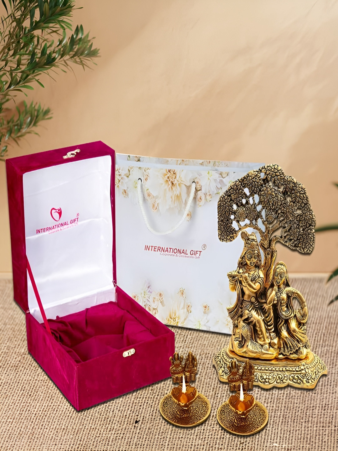 INTERNATIONAL GIFT GoldToned and Red 3 Pcs Radha Krishna God Idol With Laxmi Ganesh Diya