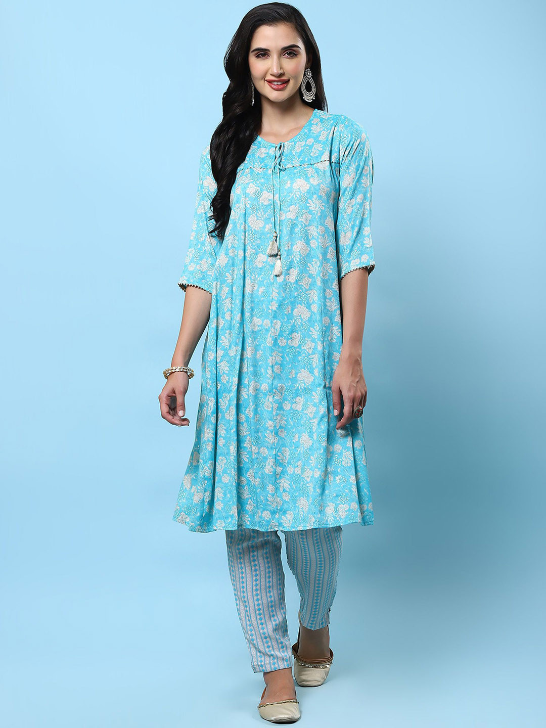 Shree Floral Printed Tie-Up Neck Liva A-Line Kurta With Trousers