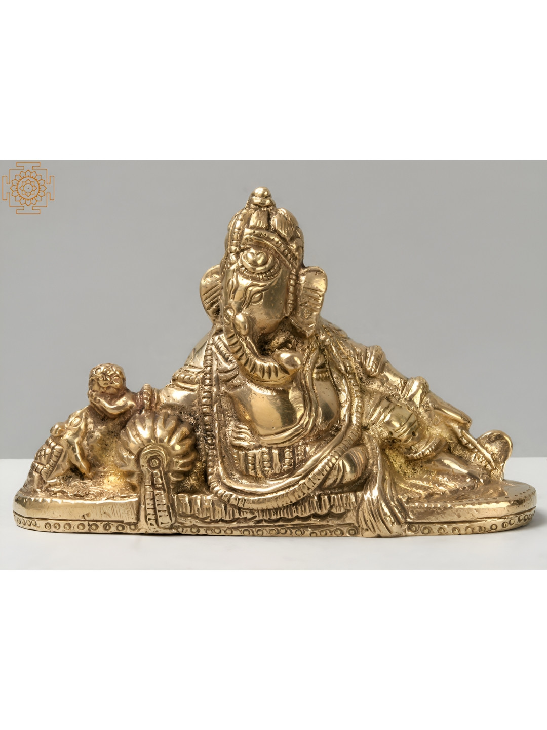 Exotic India Relaxing Lord Ganesha Gold Brass Metallic Prayer Room Medium Showpiece - 3 Inches