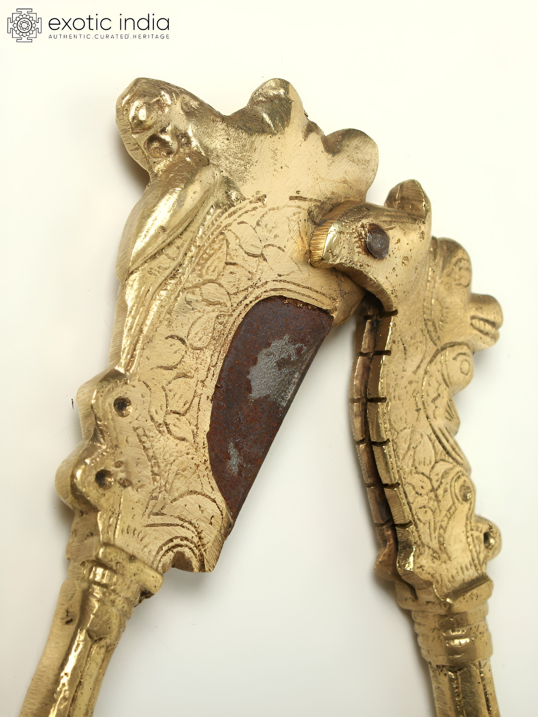 Exotic India Nut Cracker Gold Brass Metallic Living Room Small Showpiece - 2.8 Inches