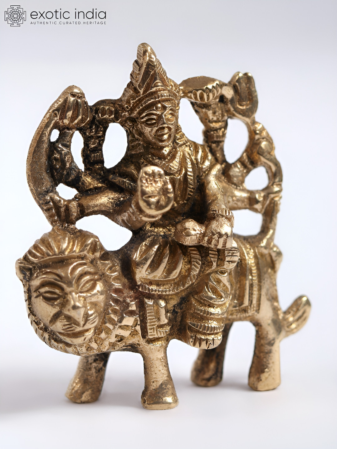 Exotic India Goddess Durga Gold Brass Metallic Prayer Room Small Showpiece - 2.5 Inches