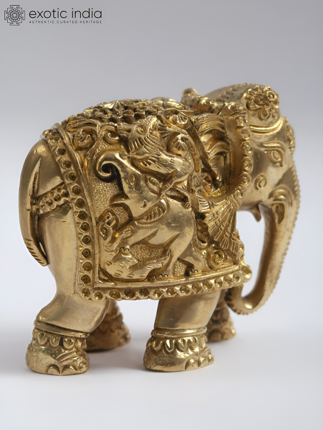Exotic India Elephant Gold Brass Metallic Prayer Room Small Showpiece - 3 Inches