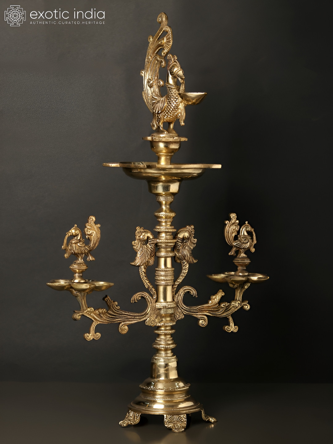 Exotic India Peacocks and Parrots Lamp Gold Brass Metallic Prayer Room Tiny Showpiece - 2.2 Inches
