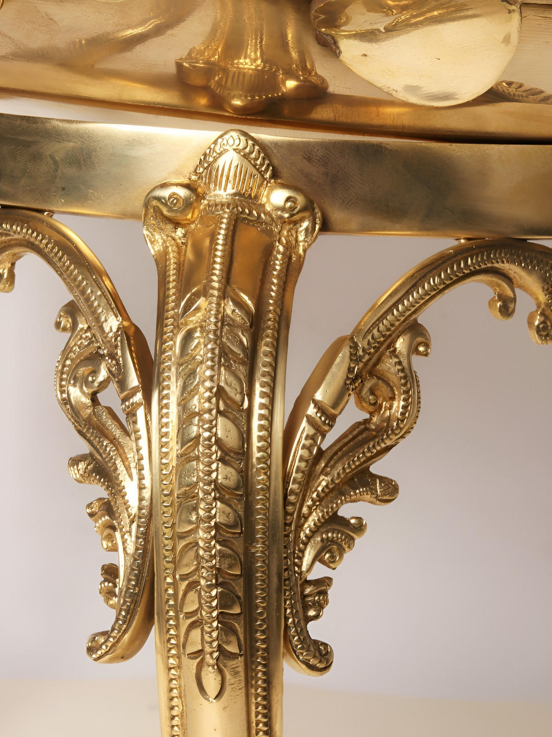 Exotic India Brass Designer Leaf Pattern Brass Urli on Chowki