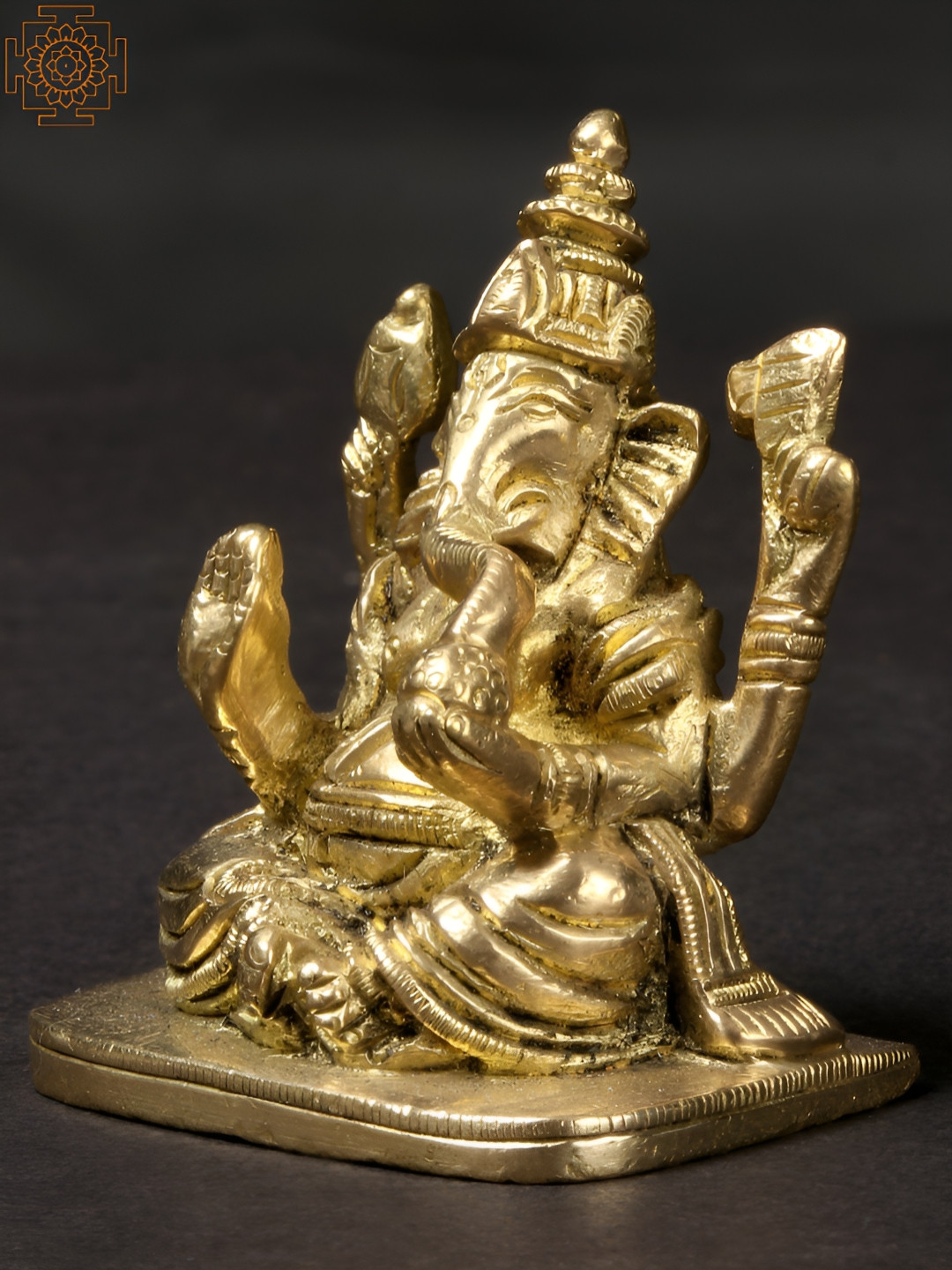 Exotic India Wisdom Ganesha Brass Gold Brass Metallic Prayer Room Medium Showpiece - 2.1 Inches
