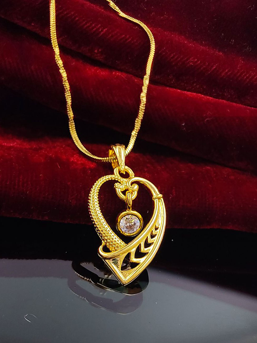 Saizen Gold-Plated Heart Shaped  Stones Studded Pendant With Chain