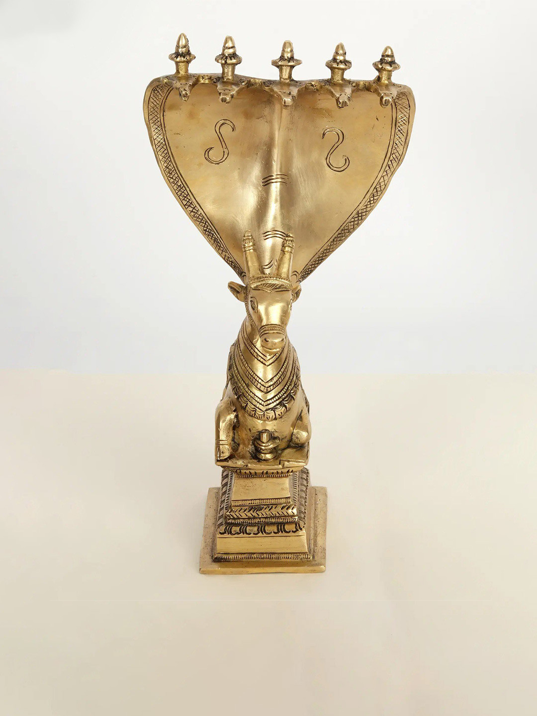 Exotic India Brass Nandi Seated with Protecting Sheshnag