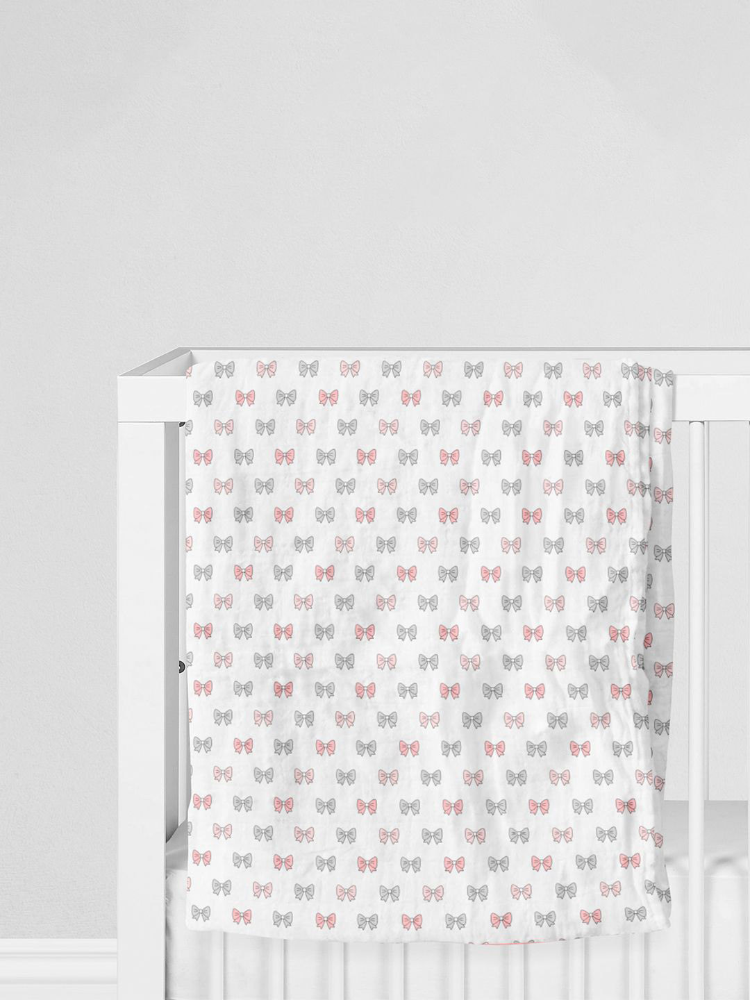 The White Cradle Infants Bow Printed Organic Cotton Swaddle