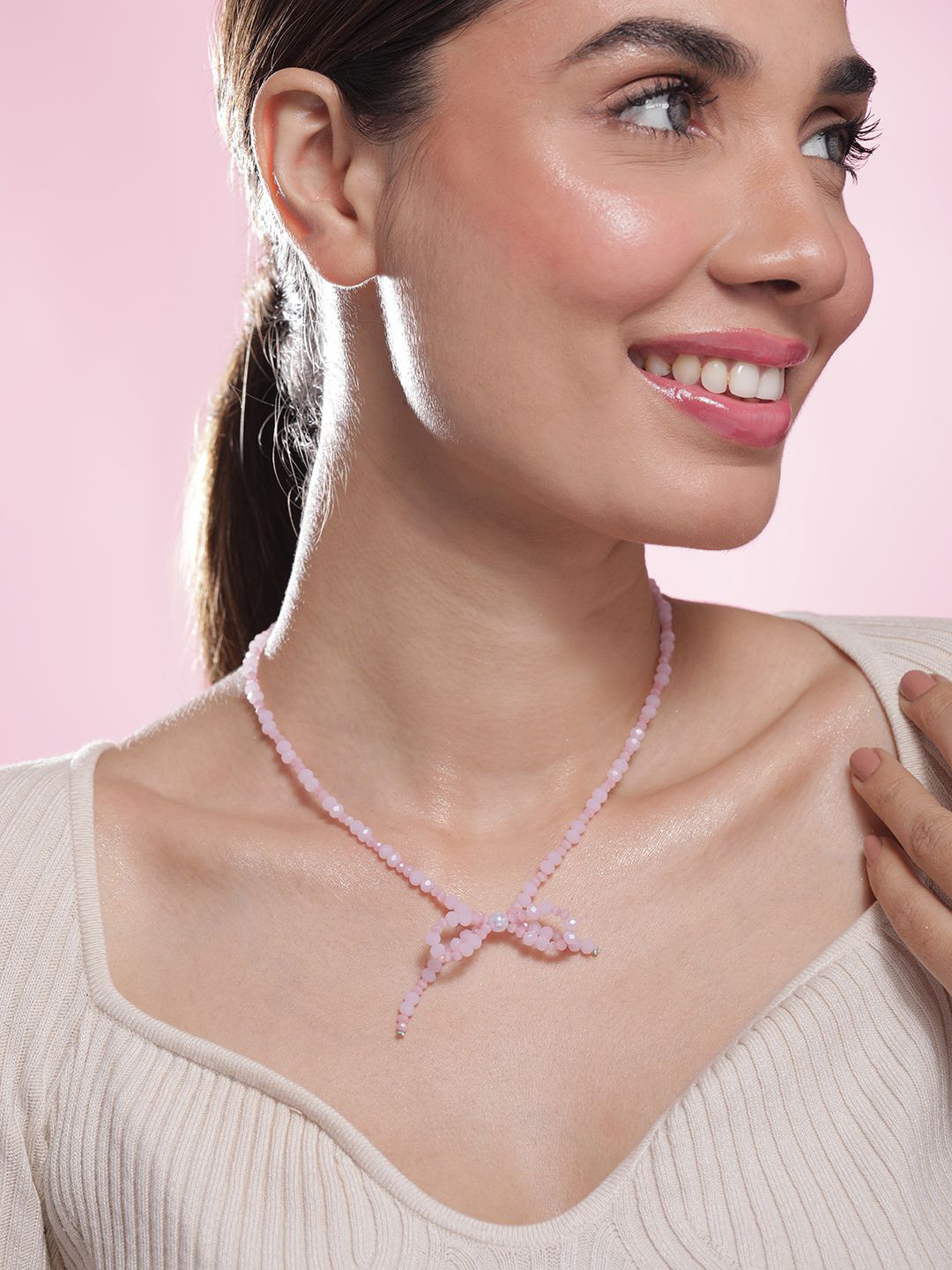 Rubans Rhodium Plated Soft Pink Beaded Necklace with Bow Charm Design
